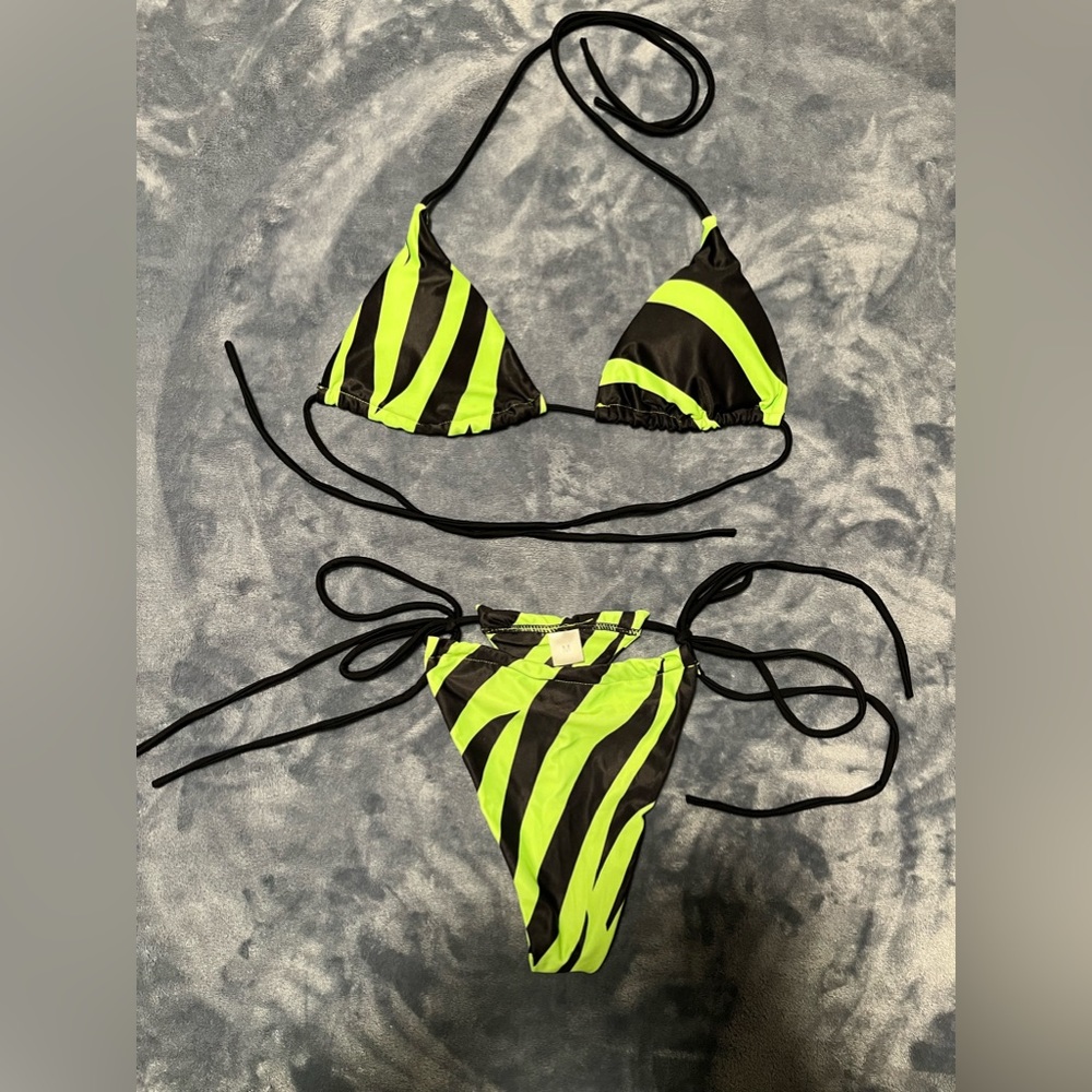 2-piece green and black striped bathing suit. Never worn.